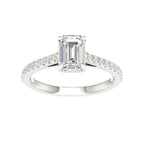 White gold ring with emerald shaped center stone