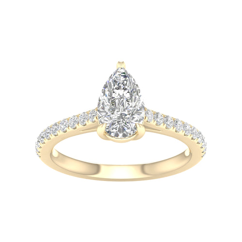 yellow gold ring with pear shaped center stone