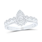 Conjunto nupcial con halo de diamantes en forma de pera de 14 quilates