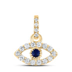evil eye pendant featuring diamonds surrounding a blue sapphire center stone, and diamonds on the bail adding a touch of elegance and protection