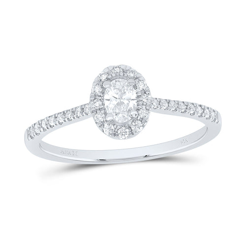 oval-cut diamond surrounded by a sparkling halo, set on a diamond-studded band for an elegant and timeless design