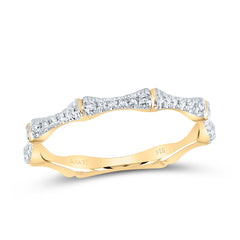 yellow gold ring featuring six diamonds separated by gold bars, with the pattern extending halfway around the band for a modern and elegant look