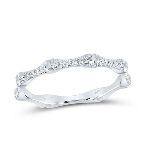 white gold ring featuring six diamonds separated by gold bars, with the pattern extending halfway around the band for a modern and elegant look