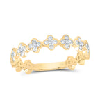 yellow gold diamond clusters arranged in a clover shape, creating a delicate and elegant design
