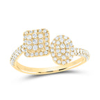 front view of a ring with oval and square diamond clusters placed next to each other, with a band that features half diamonds and half gold for a striking contrast.