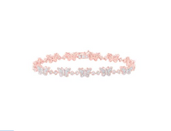 Pulsera de mariposa y trébol de diamantes de 10 quilates
