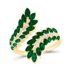 Marquise-shaped emerald wrap ring featuring multiple small emeralds, accented with sparkling diamonds for a stunning and elegant design.