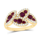 Four-leaf design ring featuring vibrant rubies and sparkling diamonds, creating a charming and elegant look with a sleek gold band