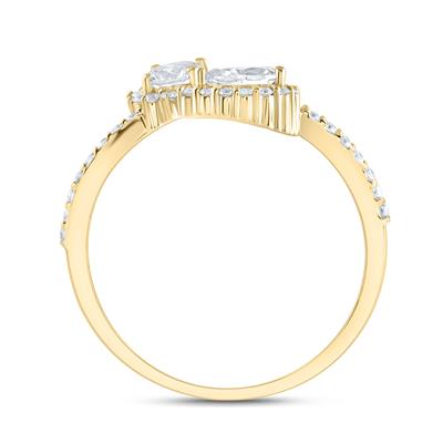 side view Round and pear-shaped solitaire diamonds set side by side on a cuff ring, with the round stone positioned higher than the pear. Each stone is surrounded by a halo of diamonds, and the band features diamonds halfway around with smooth gold on the rest