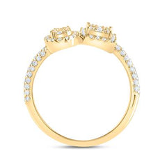 side view of a ring with oval and square diamond clusters placed next to each other, with a band that features half diamonds and half gold for a striking contrast.