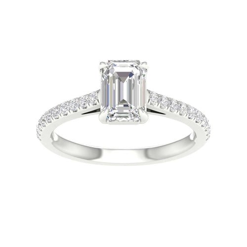 White gold ring with emerald shaped center stone
