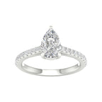 White gold ring with pear shaped center stone