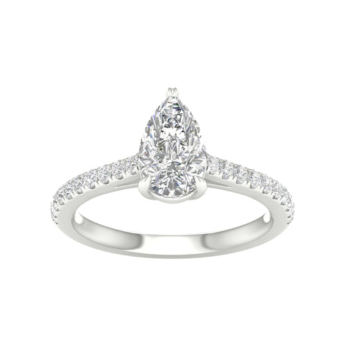 White gold ring with pear shaped center stone
