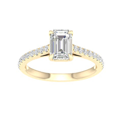 yellow gold ring with pear shaped center stone