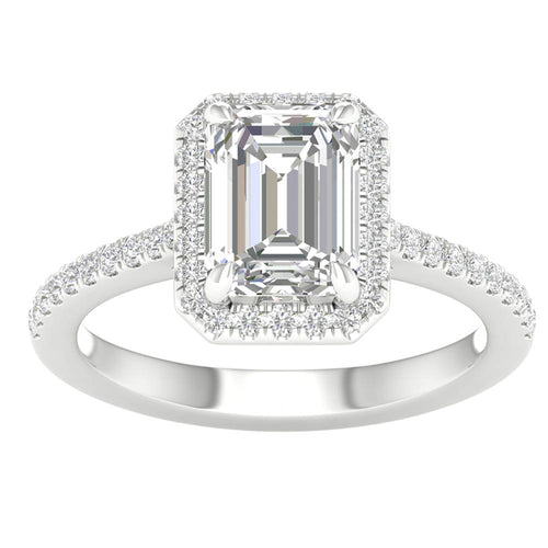 White gold ring with pear shaped center stone and halo