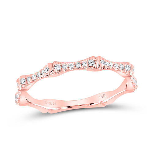 rose gold ring featuring six diamonds separated by gold bars, with the pattern extending halfway around the band for a modern and elegant look