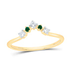 Accent concave-shaped band featuring three round diamonds and two emerald-cut diamonds on either side, creating a sophisticated and balanced design